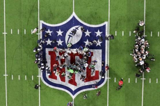 MINNEAPOLIS, MN - FEBRUARY 04: A view of the coin toss prior to Super Bowl LII between the New England Patriots and the Philadelphia Eagles at U.S. Bank Stadium on February 4, 2018 in Minneapolis, Minnesota. Rob Carr/Getty Images/AFP