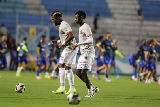 Jorge Benguché y Julián Martínez realizando trabajos de calentamiento.