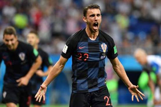 Croatia's defender Josip Pivaric celebrates after a goal during the Russia 2018 World Cup Group D football match between Iceland and Croatia at the Rostov Arena in Rostov-On-Don on June 26, 2018. / AFP PHOTO / JOE KLAMAR / RESTRICTED TO EDITORIAL USE - NO MOBILE PUSH ALERTS/DOWNLOADS