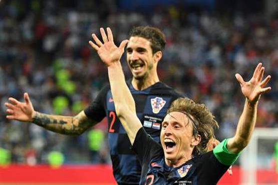 Croatia's midfielder Luka Modric celebrates after scoring their second goal during the Russia 2018 World Cup Group D football match between Argentina and Croatia at the Nizhny Novgorod Stadium in Nizhny Novgorod on June 21, 2018. / AFP PHOTO / Johannes EISELE / RESTRICTED TO EDITORIAL USE - NO MOBILE PUSH ALERTS/DOWNLOADS