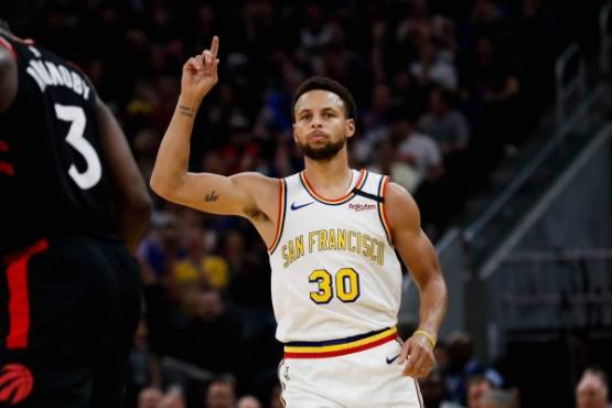 SAN FRANCISCO, CALIFORNIA - MARCH 5: Golden State Warriors' Stephen Curry (30) celebrates after scoring his first three-point-shot of the night during the second quarter of his teams game versus the Toronto Raptors at Chase Center in San Francisco on Thursday, March 5, 2020. (Randy Vazquez / Bay Area News Group)