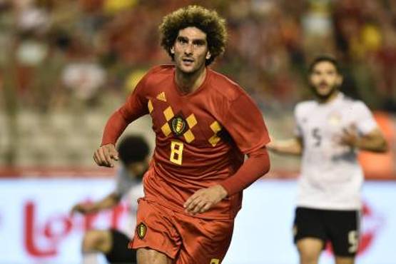 Belgium's midfielder Marouane Fellaini celebrates after scoring a goal during the international friendly football match between Belgium and Egypt at the King Baudouin Stadium, in Brussels, on June 6, 2018. / AFP PHOTO / JOHN THYS