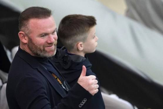 British former footballer Wayne Rooney gives a thumb-up as he attends the UEFA Europa League final football match between Villarreal and Manchester United at the Gdansk Stadium in Gdansk on May 26, 2021. (Photo by ALEKSANDRA SZMIGIEL / various sources / AFP)