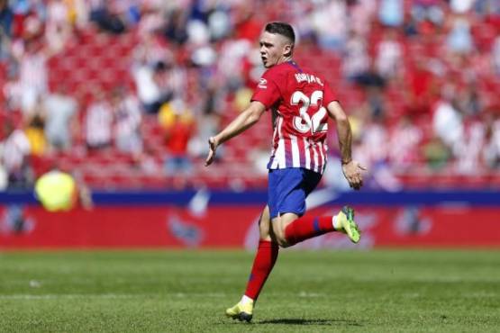 Atletico Madrid's Spanish midfielder Borja Garces celebrates after scoring during the Spanish league football match between Club Atletico de Madrid and Eibar at the Wanda Metropolitan stadium in Madrid on September 15, 2018. / AFP PHOTO / Benjamin CREMEL