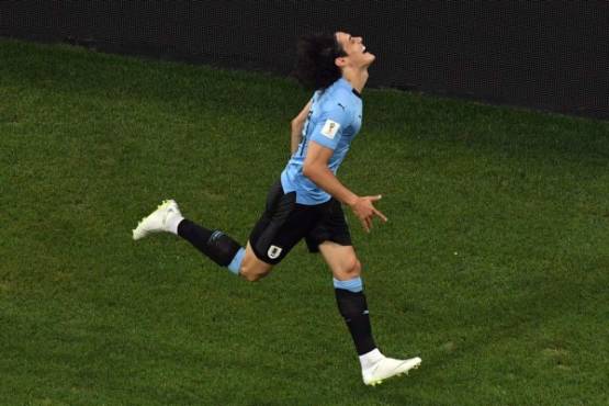 Uruguay's forward Edinson Cavani celebrates after scoring a goal during the Russia 2018 World Cup round of 16 football match between Uruguay and Portugal at the Fisht Stadium in Sochi on June 30, 2018. / AFP PHOTO / Kirill KUDRYAVTSEV / RESTRICTED TO EDITORIAL USE - NO MOBILE PUSH ALERTS/DOWNLOADS