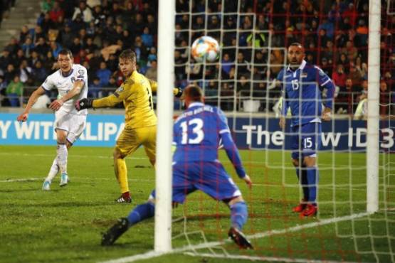 Italy's forward Andrea Belotti scores a goal during the Euro 2020 Group J qualification football match between Liechtenstein and Italy at the Rheinpark Stadium in Vaduz, on October 15, 2019. (Photo by STEFAN WERMUTH / AFP)