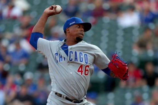 ARLINGTON, TEXAS - MARCH 28: Pedro Strop #46 of the Chicago Cubs pitches against the Texas Rangers in the bottom of the ninth inning during Opening Day at Globe Life Park in Arlington on March 28, 2019 in Arlington, Texas. Tom Pennington/Getty Images/AFP