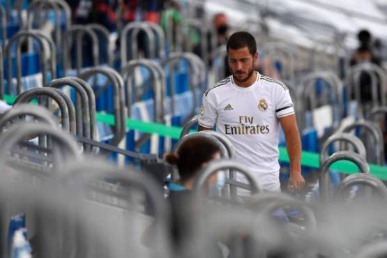 Real Madrid's Belgian forward Eden Hazard walks on the grandstands after leaving the pitch during the Spanish League football match between Real Madrid CF and SD Eibar at the Alfredo di Stefano stadium in Valdebebas, on the outskirts of Madrid, on June 14, 2020. (Photo by PIERRE-PHILIPPE MARCOU / AFP)
