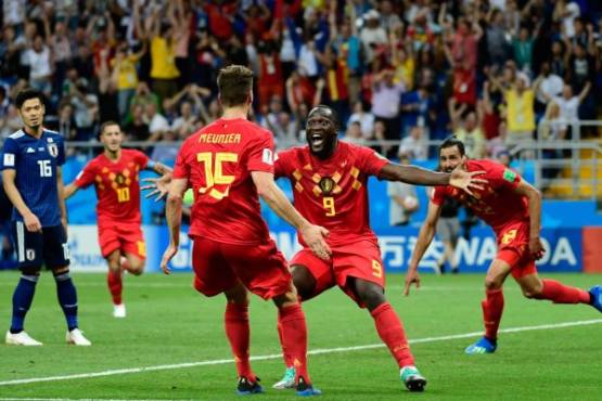 Belgium's forward Romelu Lukaku (C) celebrates with Belgium's defender Thomas Meunier (3L) after Belgium's midfielder Nacer Chadli (R) scored his team's third goal during the Russia 2018 World Cup round of 16 football match between Belgium and Japan at the Rostov Arena in Rostov-On-Don on July 2, 2018. / AFP PHOTO / PIERRE-PHILIPPE MARCOU / RESTRICTED TO EDITORIAL USE - NO MOBILE PUSH ALERTS/DOWNLOADS