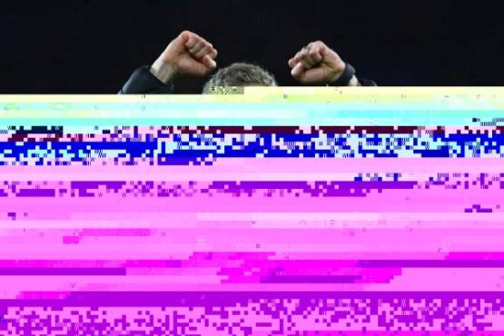 Manchester United's Norwegian caretaker manager Ole Gunnar Solskjaer celebrates on the pitch after the English Premier League football match between between Cardiff City and Manchester United at Cardiff City Stadium in Cardiff, south Wales on December 22, 2018. - Manchester United won the game 5-1. (Photo by Geoff CADDICK / AFP) / RESTRICTED TO EDITORIAL USE. No use with unauthorized audio, video, data, fixture lists, club/league logos or 'live' services. Online in-match use limited to 120 images. An additional 40 images may be used in extra time. No video emulation. Social media in-match use limited to 120 images. An additional 40 images may be used in extra time. No use in betting publications, games or single club/league/player publications. /