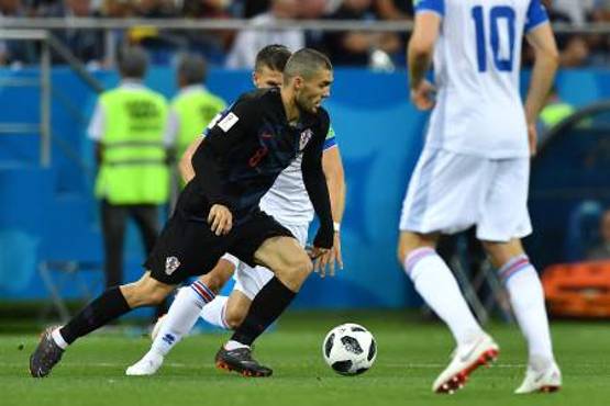 Croatia's midfielder Mateo Kovacic runs with the ball during the Russia 2018 World Cup Group D football match between Iceland and Croatia at the Rostov Arena in Rostov-On-Don on June 26, 2018. / AFP PHOTO / JOE KLAMAR / RESTRICTED TO EDITORIAL USE - NO MOBILE PUSH ALERTS/DOWNLOADS