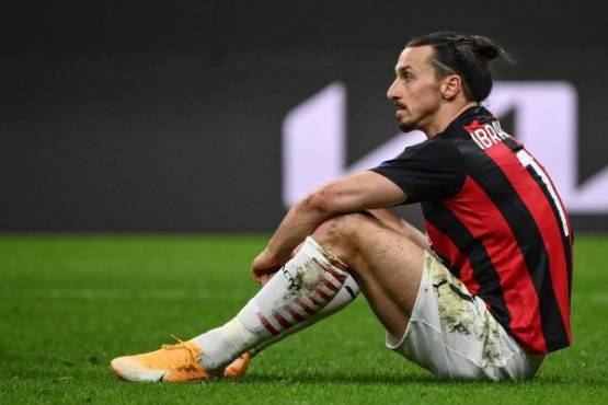 AC Milan's Swedish forward Zlatan Ibrahimovic reacts at the end of the UEFA Europa League round of 16 second leg football match between AC Milan and Manchester United at San Siro stadium in Milan on March 18, 2021. (Photo by Marco BERTORELLO / AFP)