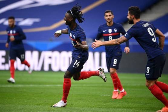 France's midfielder Eduardo Camavinga (C) celebrates after scoring a goal during the International friendly football match between France and Ukraine, on October 7, 2020 in Saint-Denis, outside Paris. (Photo by FRANCK FIFE / AFP)
