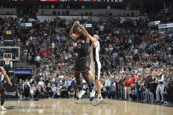 SAN ANTONIO, TX - MAY 9: Manu Ginobili #20 of the San Antonio Spurs blocks the shot of James Harden #13 of the Houston Rockets in Game Five of the Western Conference Semifinals on May 9, 2017 at the AT&T Center in San Antonio, Texas. NOTE TO USER: User expressly acknowledges and agrees that, by downloading and or using this photograph, user is consenting to the terms and conditions of the Getty Images License Agreement. Mandatory Copyright Notice: Copyright 2017 NBAE Mark Sobhani/NBAE via Getty Images/AFP