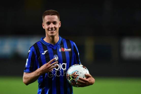 Atalanta's Croatian midfielder Mario Pasalic poses at the end of the match after scoring three goals during the Italian Serie A football match Atalanta vs Brescia played on July 14, 2020 behind closed doors at the Atleti Azzurri d'Italia stadium in Bergamo, as the country eases its lockdown aimed at curbing the spread of the COVID-19 infection, caused by the novel coronavirus. (Photo by MIGUEL MEDINA / AFP)