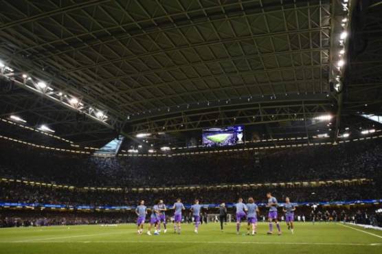 Real Madrid's players warm up ahead of the UEFA Champions League final football match between Juventus and Real Madrid at The Principality Stadium in Cardiff, south Wales, on June 3, 2017. / AFP PHOTO / Glyn KIRK