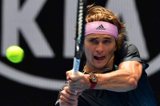 Germany's Alexander Zverev hits a return against Slovenia's Aljaz Bedene during their men's singles match on day two of the Australian Open tennis tournament in Melbourne on January 15, 2019. (Photo by Paul Crock / AFP) / -- IMAGE RESTRICTED TO EDITORIAL USE - STRICTLY NO COMMERCIAL USE --