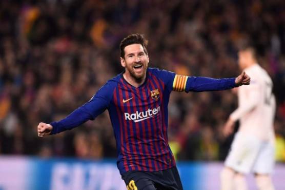 Barcelona's Argentinian forward Lionel Messi celebrates after scoring during the UEFA Champions League quarter-final second leg football match between Barcelona and Manchester United at the Camp Nou stadium in Barcelona on April 16, 2019. (Photo by Josep LAGO / AFP)