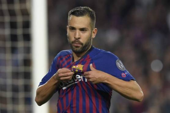 Barcelona's Spanish defender Jordi Alba celebrates after scoring during the UEFA Champions League group B match Barcelona against Inter Milan at the Camp Nou stadium in Barcelona on October 24, 2018. (Photo by LLUIS GENE / AFP)