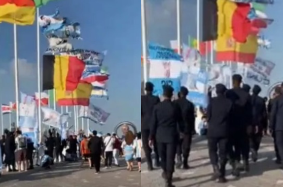 El momento en el que agentes de la policía catarí llegó al lugar de las zonas de las banderas para quitar los trapos argentinos. Fotos: OLÉ.