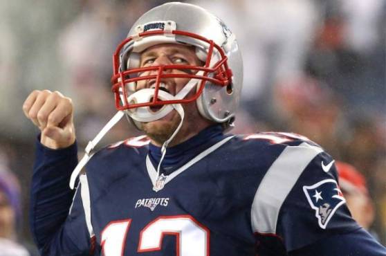KANSAS CITY, MISSOURI - JANUARY 20: Tom Brady #12 of the New England Patriots reacts after defeating the Kansas City Chiefs in overtime during the AFC Championship Game at Arrowhead Stadium on January 20, 2019 in Kansas City, Missouri. The Patriots defeated the Chiefs 37-31. Patrick Smith/Getty Images/AFP