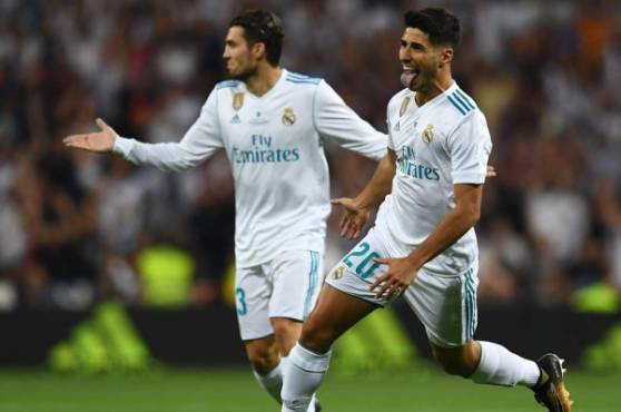 Marco Asensio volvió a anotarle al Barcelona en el clásico. FOTO: AFP