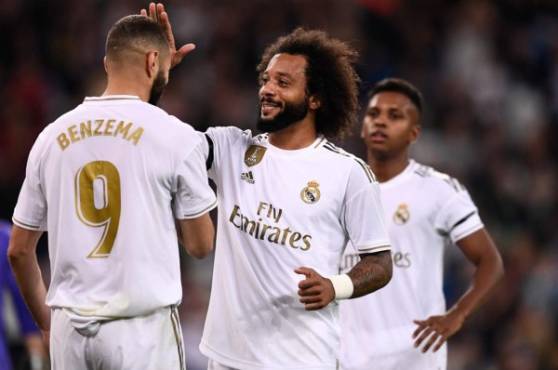Benzema festeja con Marcelo el cuarto tanto del encuentro al minuto 69. Fotos AFP