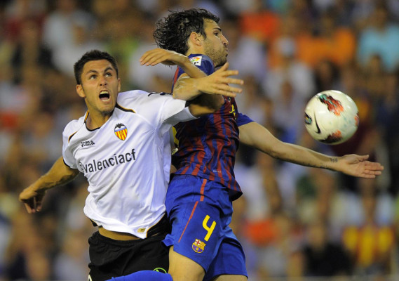 Valencia empata con el Barça y lidera la Liga española