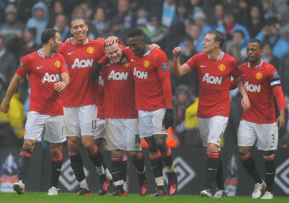 Fiesta del fútbol en la ciudad de Manchester.