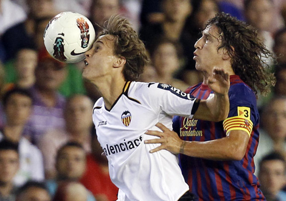 Valencia empata con el Barça y lidera la Liga española