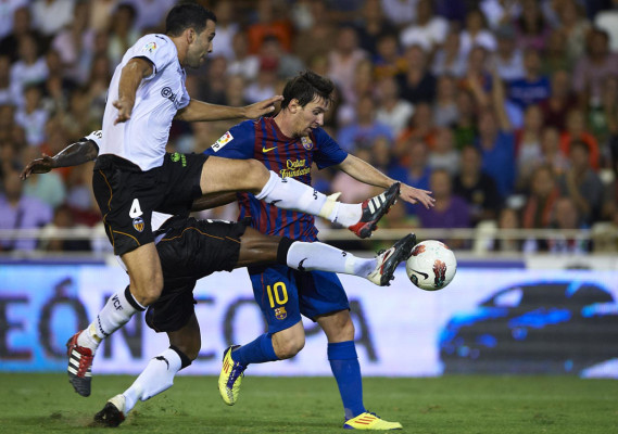 Valencia empata con el Barça y lidera la Liga española