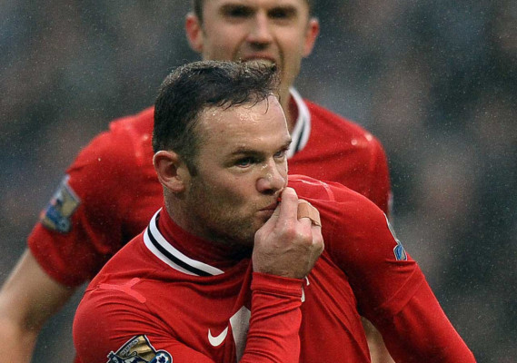 Fiesta del fútbol en la ciudad de Manchester.
