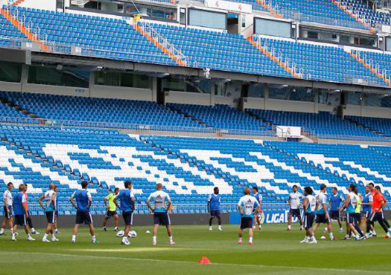 Imágenes del primer entrenamiento de Essien con el Real Madrid.