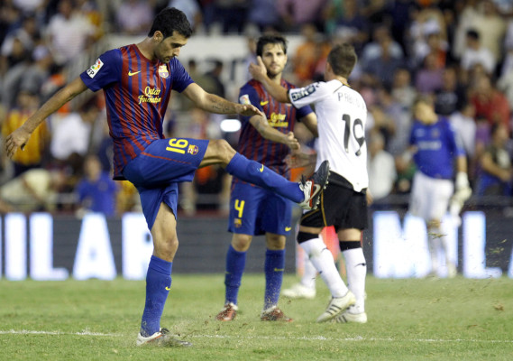 Valencia empata con el Barça y lidera la Liga española