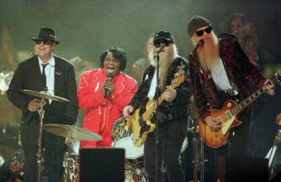 John Goodman, Dan Aykroyd and Jim Belushi of The Blues Brothers and James Brown.