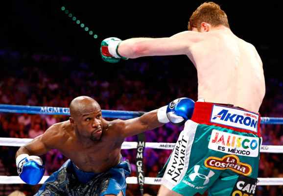 Floyd Mayweather gana con contudencia a Saul 'Canelo' Álvarez