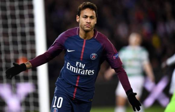 Paris Saint-Germain's Brazilian striker Neymar gestures after scoring during the UEFA Champions League Group B football match between Paris Saint-Germain (PSG) and Glasgow Celtic at Parc des Princes Stadium in Paris on November 22, 2017. / AFP PHOTO / FRANCK FIFE
