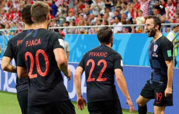 Rostov-on-don (Russian Federation), 26/06/2018.- Milan Badelj (R) of Croatia celebrates with his teammates after scoring the 1-0 lead during the FIFA World Cup 2018 group D preliminary round soccer match between Iceland and Croatia in Rostov-On-Don, Russia, 26 June 2018. (RESTRICTIONS APPLY: Editorial Use Only, not used in association with any commercial entity - Images must not be used in any form of alert service or push service of any kind including via mobile alert services, downloads to mobile devices or MMS messaging - Images must appear as still images and must not emulate match action video footage - No alteration is made to, and no text or image is superimposed over, any published image which: (a) intentionally obscures or removes a sponsor identification image; or (b) adds or overlays the commercial identification of any third party which is not officially associated with the FIFA World Cup) (Croacia, Mundial de Fútbol, Rusia, Islandia) EFE/EPA/KHALED ELFIQI EDITORIAL USE ONLY
