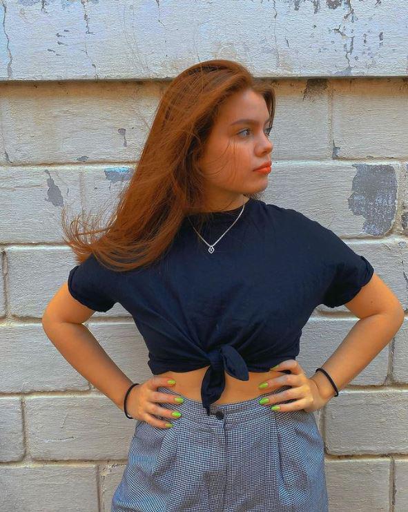 Iving Bruni, la hermosa pelirroja y prometida de Denil Maldonado que acaparó las cámaras como fotógrafa en el clásico capitalino