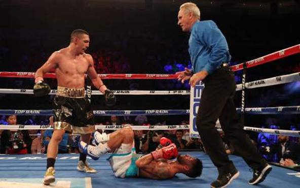 NEW ORLEANS, LA - JULY 14: Teofimo Lopez (L) knocks down Willian Silva during the Regis Prograis v Juan Jose Velasco ESPN boxing match at the UNO Lakefront Arena on July 14, 2018 in New Orleans, Louisiana. (Photo by Alex Menendez/Getty Images)