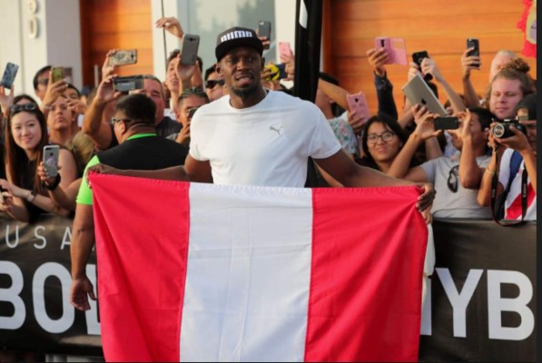 Las mejores imagenes de la carrera entre Usain Bolt y una Mototaxi