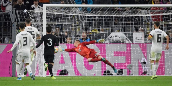 Germany's goalkeeper Marc-Andre Ter Stegen fails to save the 2-2 goal during the friendly football match Germnay v Argentina at the Signal-Iduna Park in Dortmund, western Germany on October 9, 2019. (Photo by Ina FASSBENDER / AFP)