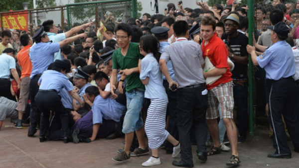 Visita de Beckham a China provoca más de cinco heridos