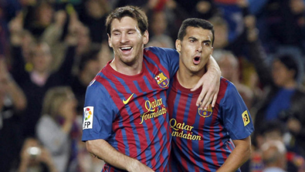 Messi guía al Barcelona a la cima