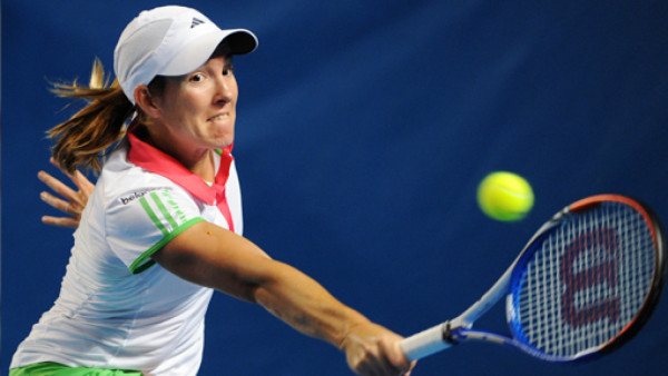 Wozniacki y Henin avanzan sin problemas