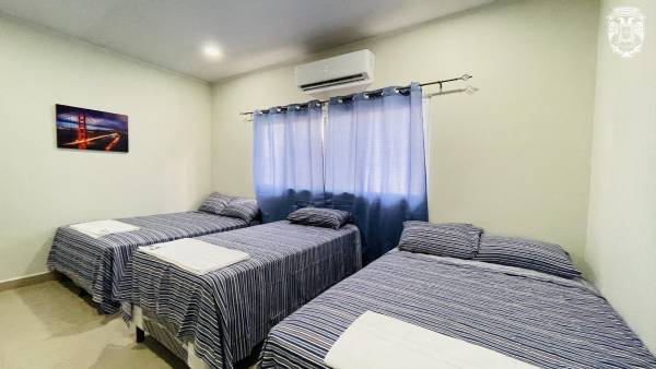 Así lucen las habitaciones dentro del hotel verde de Marathón en San Pedro Sula.