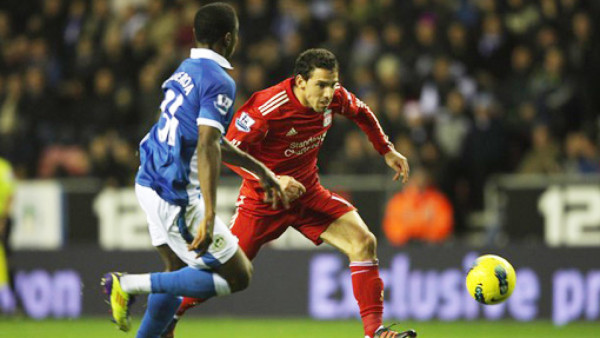Wigan logró un punto vital ante Liverpool