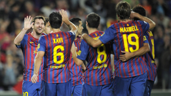 Messi guía al Barcelona a la cima