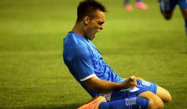 Inter Milan's Argentinian forward Lautaro Martinez (C) celebrates after scoring his team's second goal during the Italian Serie A football match Inter Milan vs SPAL on December 1, 2019, at the San Siro stadium in Milan. (Photo by MIGUEL MEDINA / AFP)
