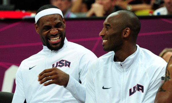 LONDON, ENGLAND - AUGUST 02: Lebron James #6 of United States and Kobe Bryant #10 of United States look on during the Men's Basketball Preliminary Round match against Nigeria on Day 6 of the London 2012 Olympic Games at Basketball Arena on August 2, 2012 in London, England. (Photo by Mike Hewitt/Getty Images)